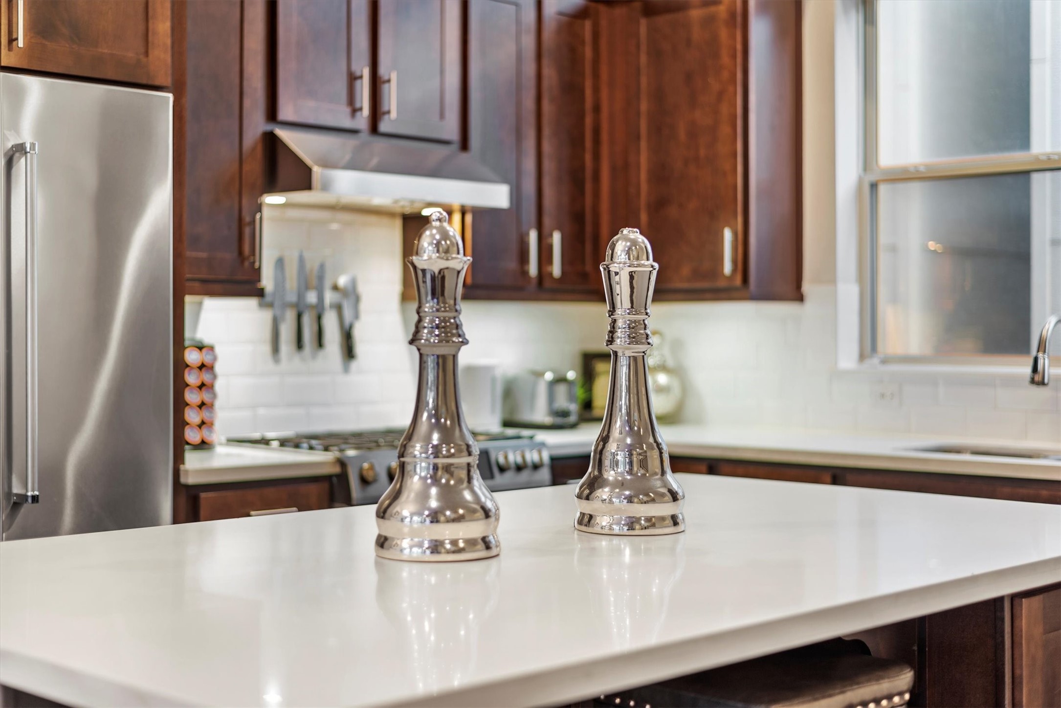 4413 Eli Street Houston, TX 77007 - Photo 10 of 47 a kitchen with a sink and a refrigerator