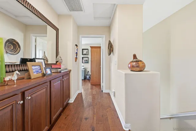 a view of a kitchen from the hallway