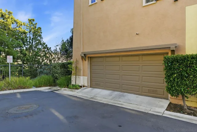 a view of a house with a street