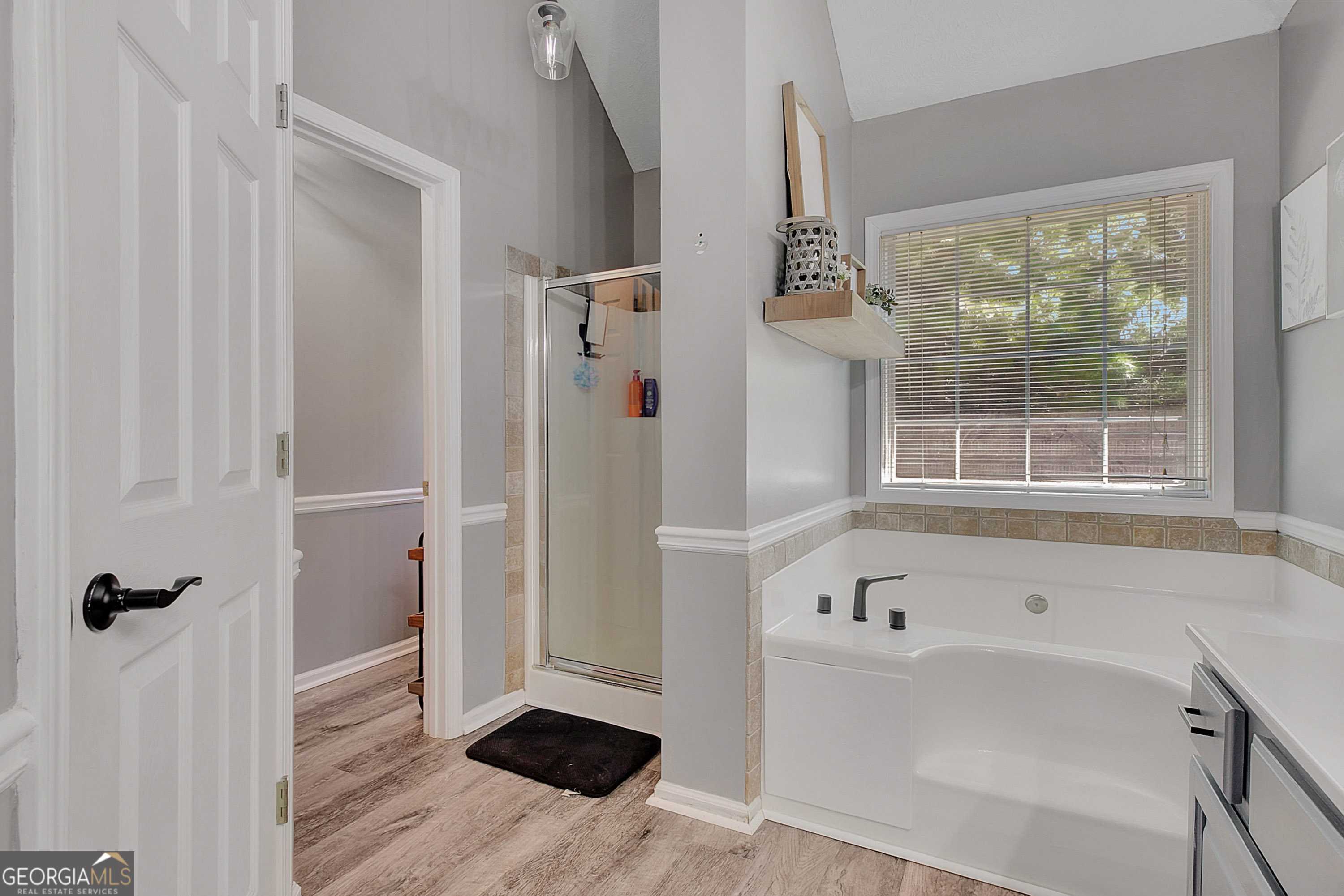 229 John Lovelace Road LaGrange, GA 30241 - Photo 18 of 59 a bathroom with a bathtub and a window