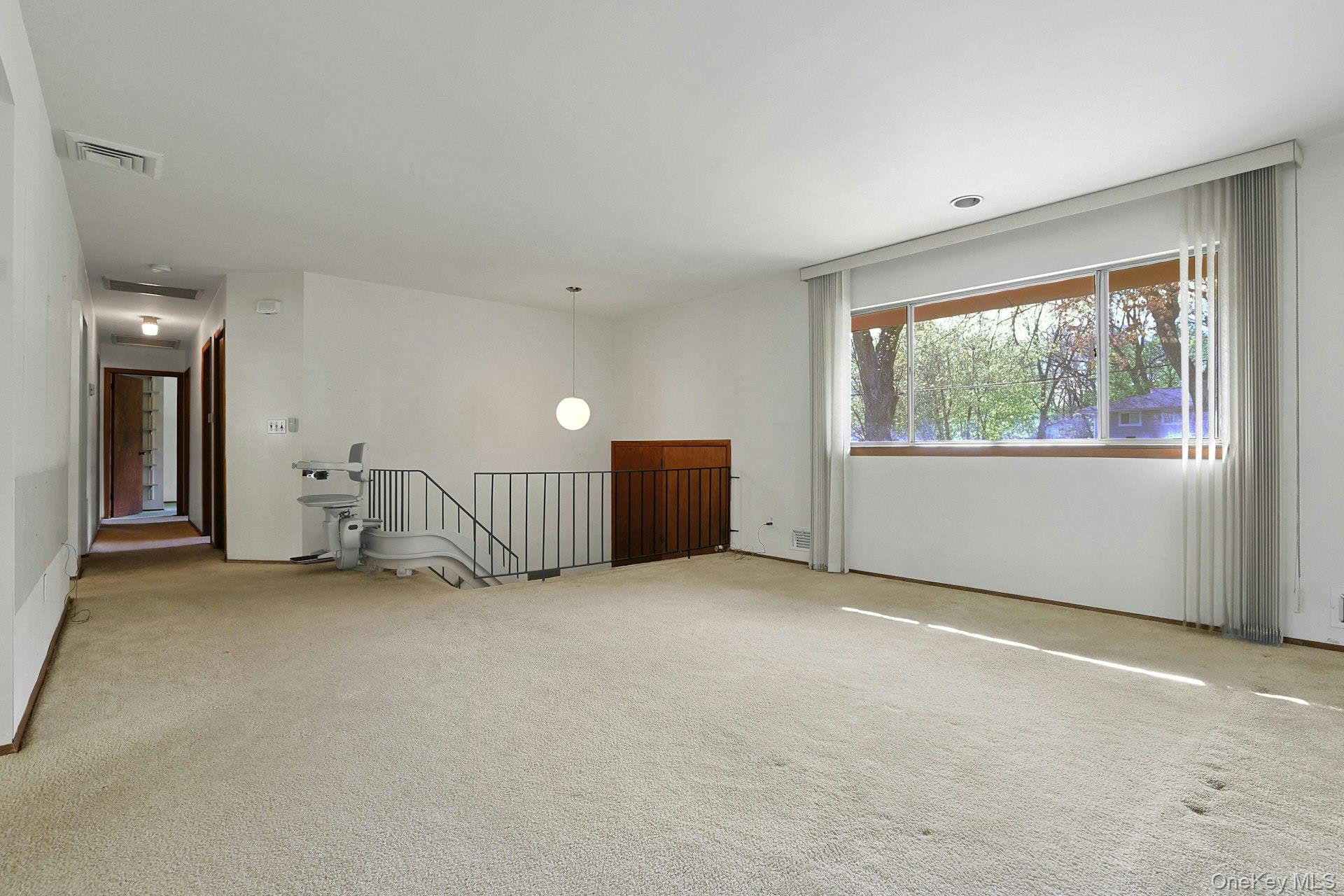 44 Southgate Drive Spring Valley, NY 10977 - Photo 5 of 24 an empty room with windows