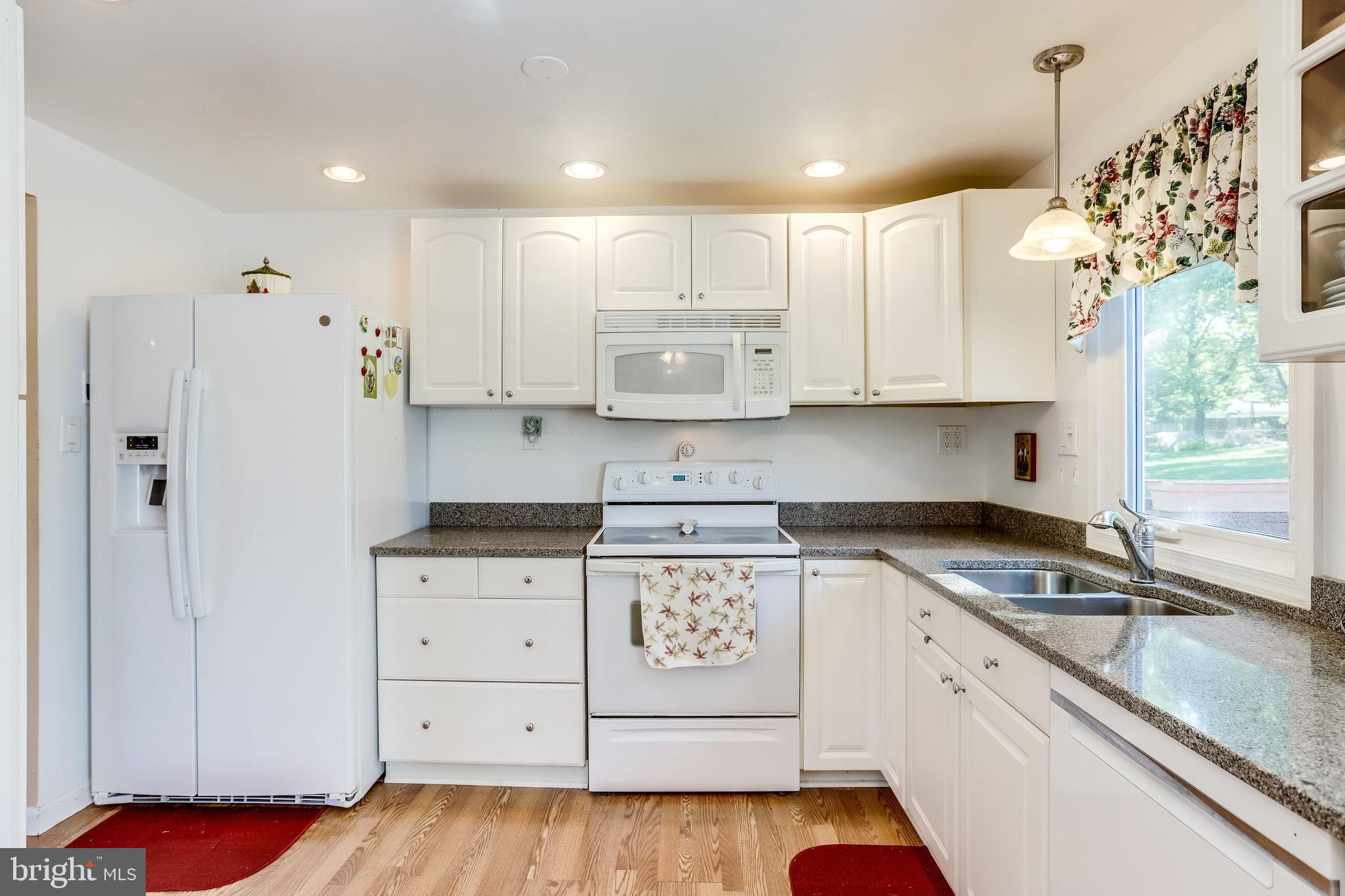 128 North Garfield Road Sterling, VA 20164 - Photo 2 of 39 Updated kitchen with bright white cabinets