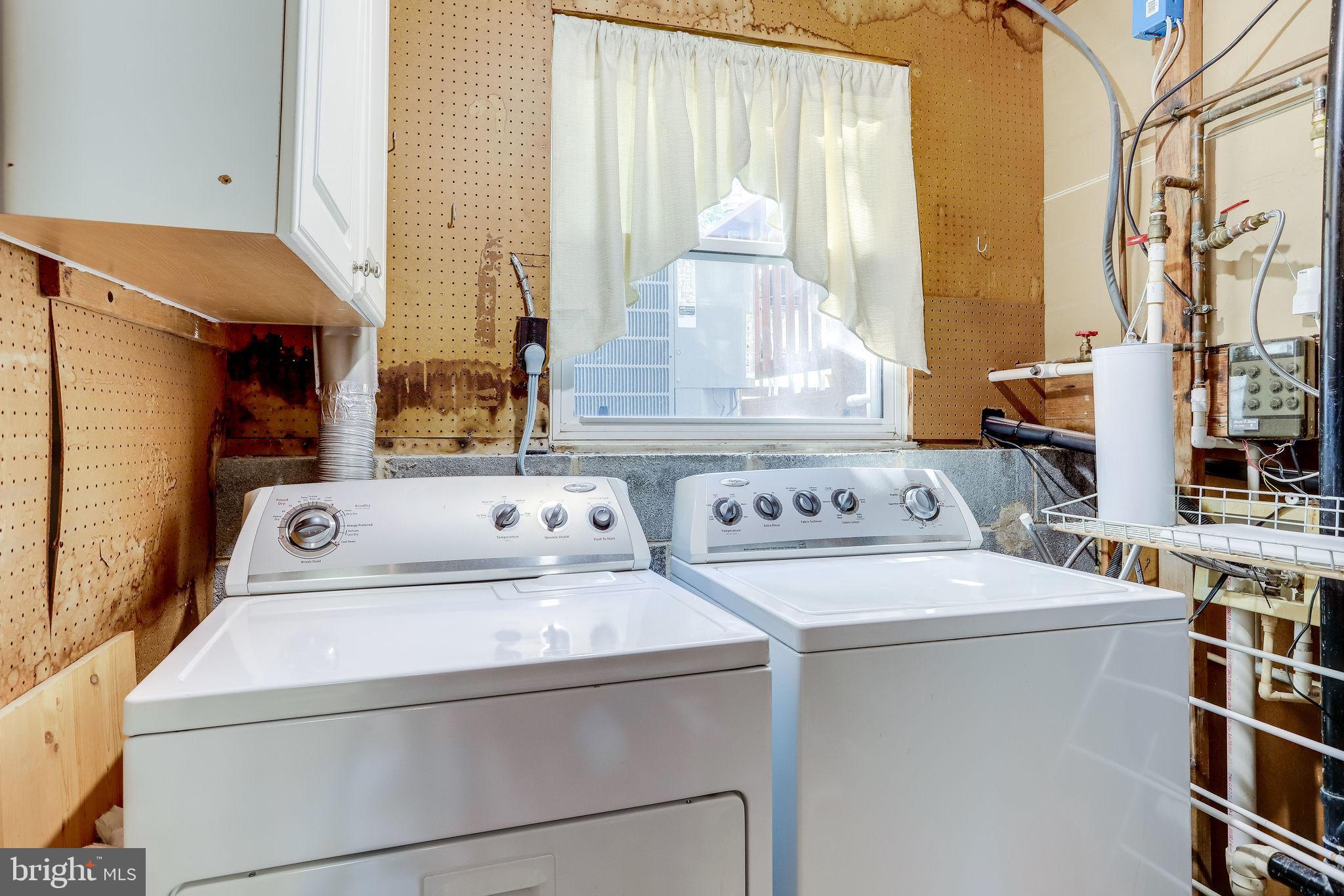 128 North Garfield Road Sterling, VA 20164 - Photo 30 of 39 Lower level laundry with window
