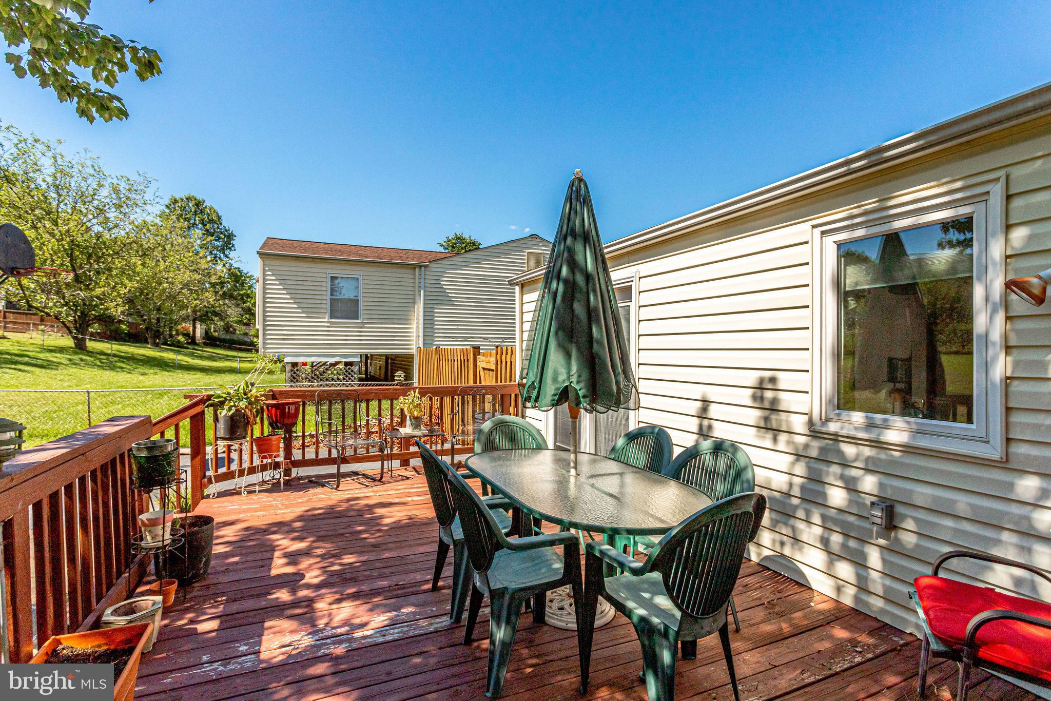 128 North Garfield Road Sterling, VA 20164 - Photo 31 of 39 Enjoy dinner outdoors on the deck