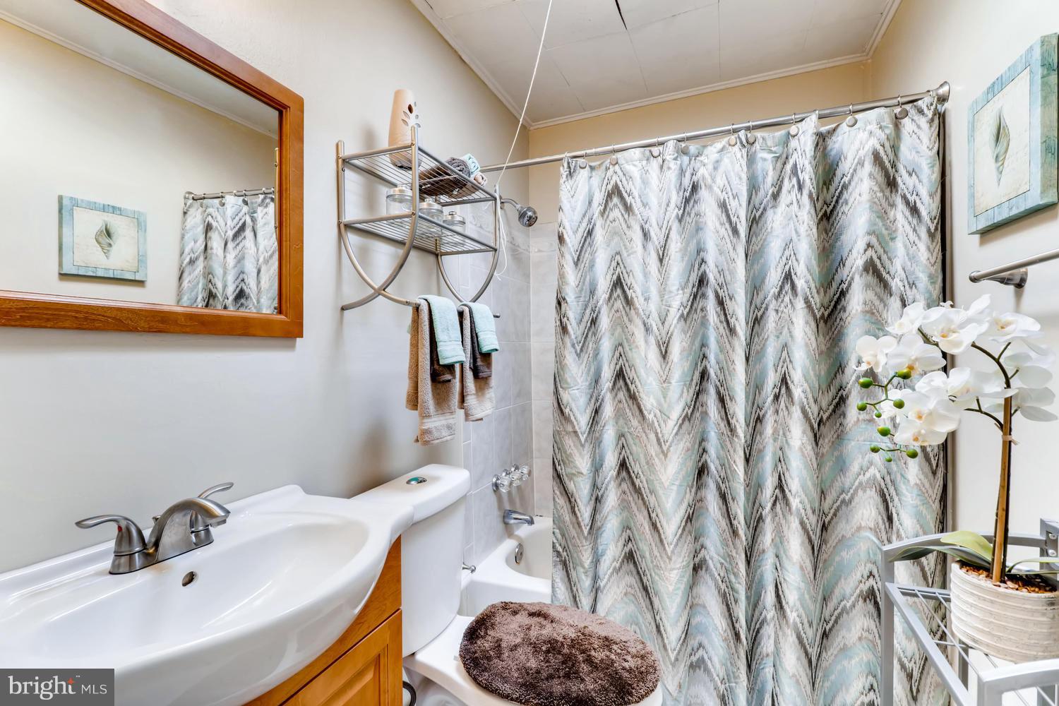 2717 Hollins Ferry Road Baltimore, MD 21230 - Photo 21 of 30 Bathroom has ceramic tile floors and a skylight
