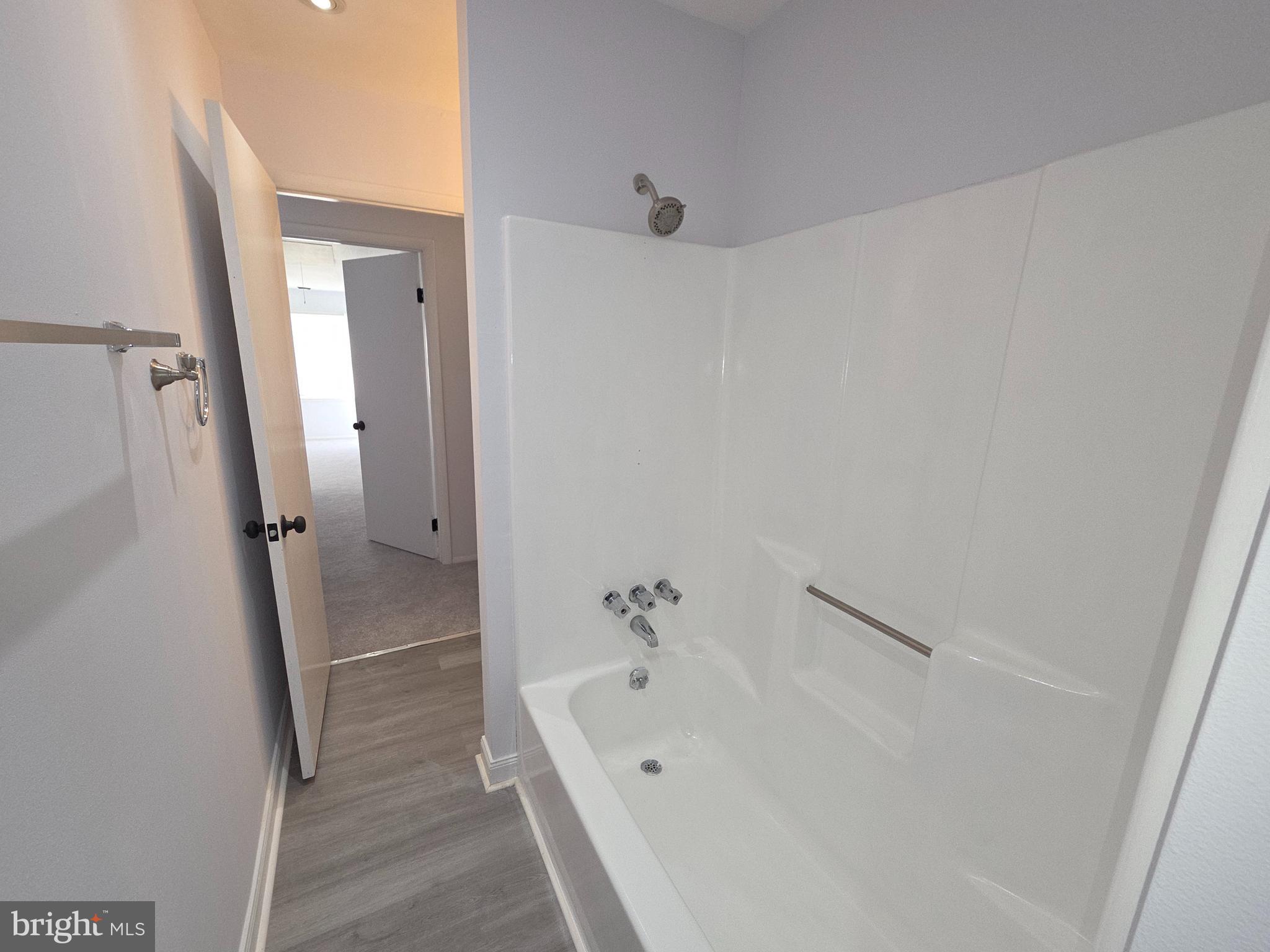 70 Suburban Boulevard Delran, NJ 08075 - Photo 29 of 40 a white bath tub sitting next to a white sink