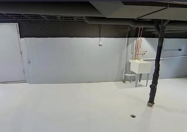 a view of a white house with a yard