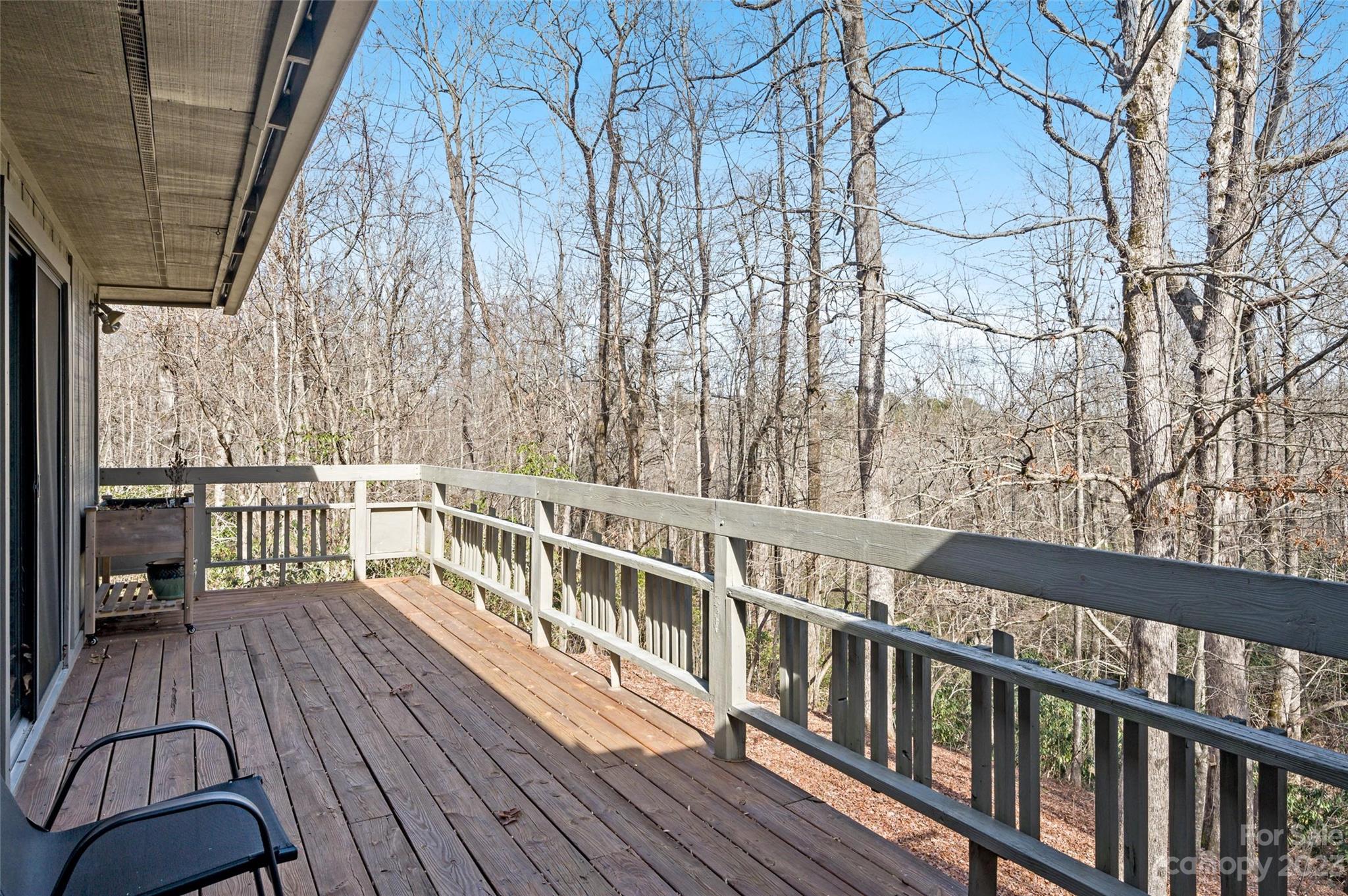 139 Panther Gap Road Brevard, NC 28712 - Photo 27 of 42 a view of balcony with wooden floor and fence