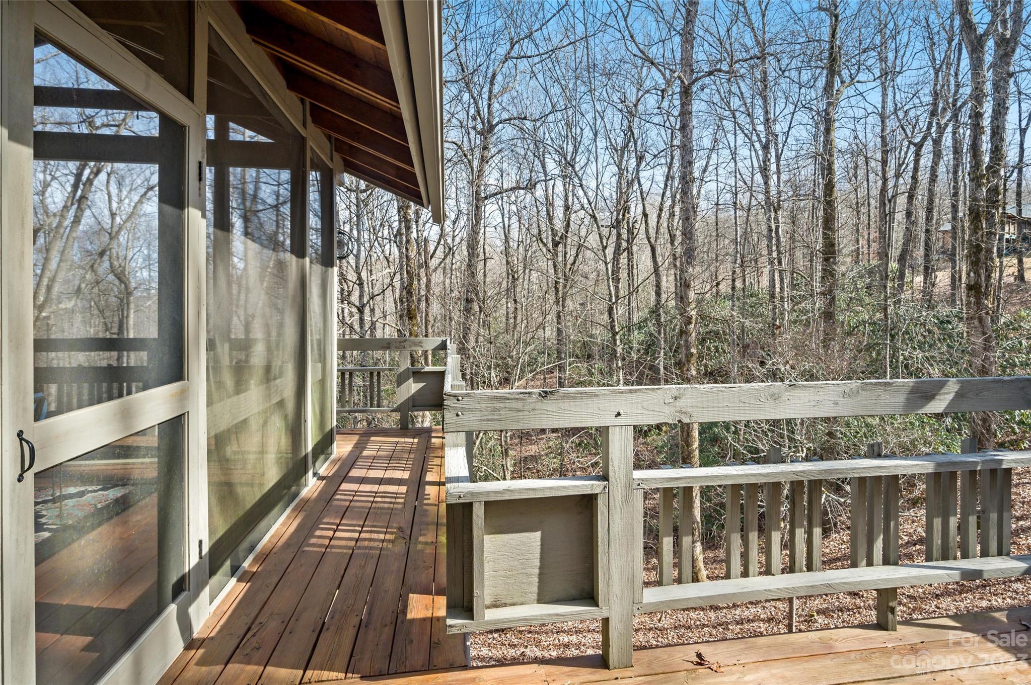 139 Panther Gap Road Brevard, NC 28712 - Photo 28 of 42 a balcony with a stove and wooden floor