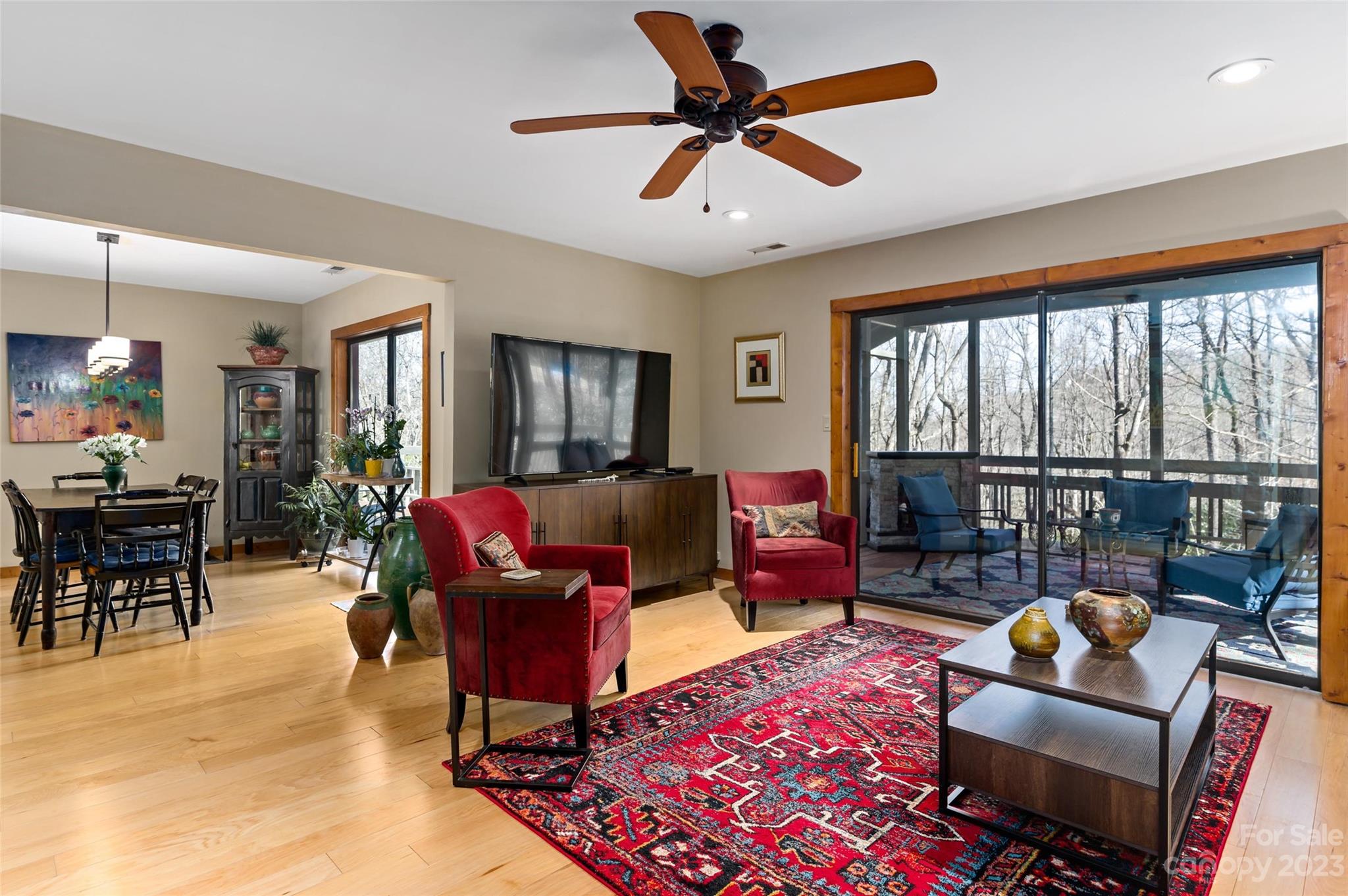 139 Panther Gap Road Brevard, NC 28712 - Photo 3 of 42 a living room with furniture and a large window