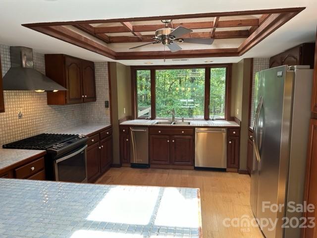 139 Panther Gap Road Brevard, NC 28712 - Photo 39 of 42 a kitchen with a sink a counter top space and stainless steel appliances