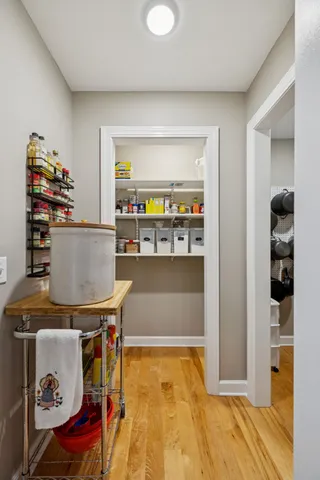 a bathroom with a glass shower door
