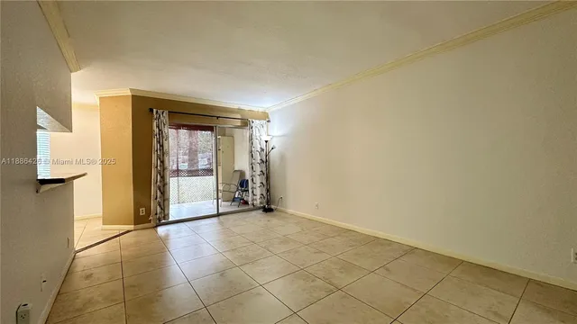 a view of an empty room and window