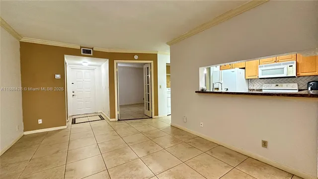 a view of a livingroom with wooden floor