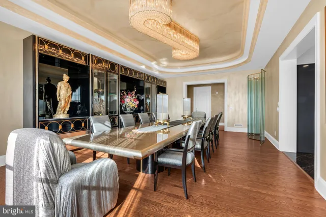 a view of a dining room with furniture and window