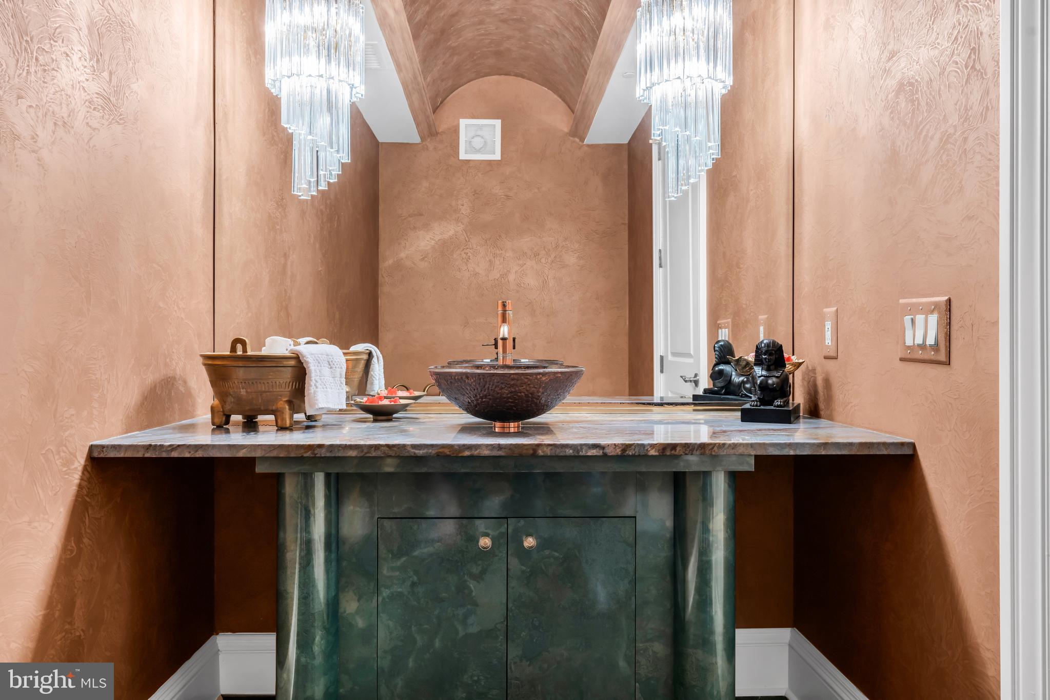 1041 Oval Road Manasquan, NJ 08736 - Photo 19 of 30 a bathroom with a sink and a mirror