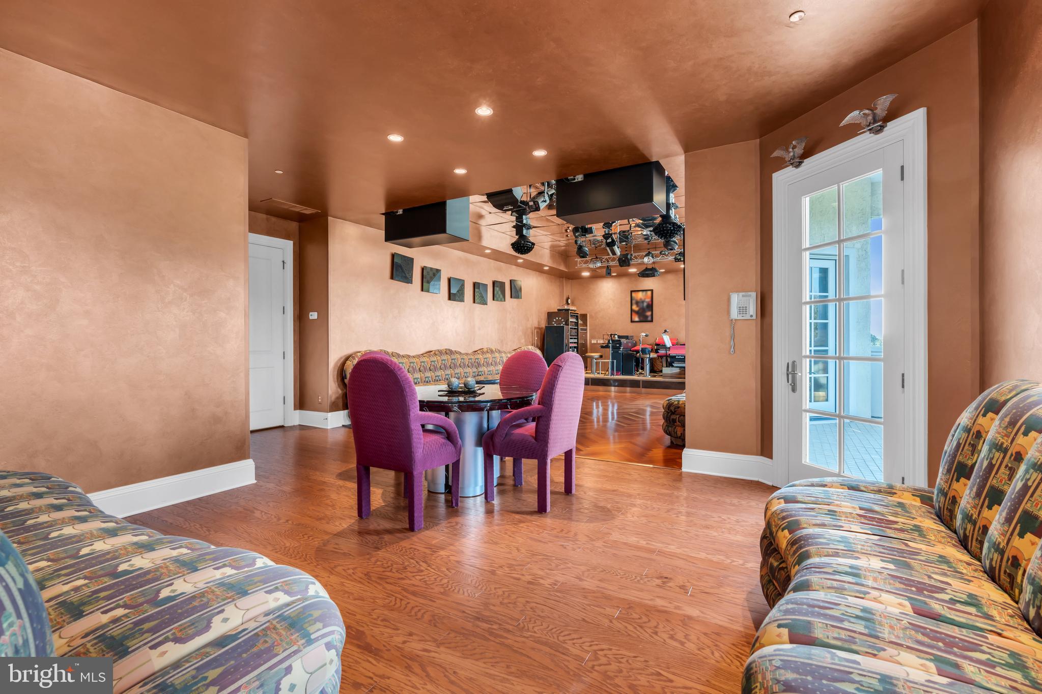 1041 Oval Road Manasquan, NJ 08736 - Photo 28 of 30 a view of a livingroom with furniture window and wooden floor