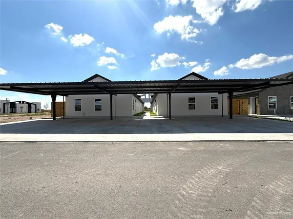 a black and white building with a outdoor space