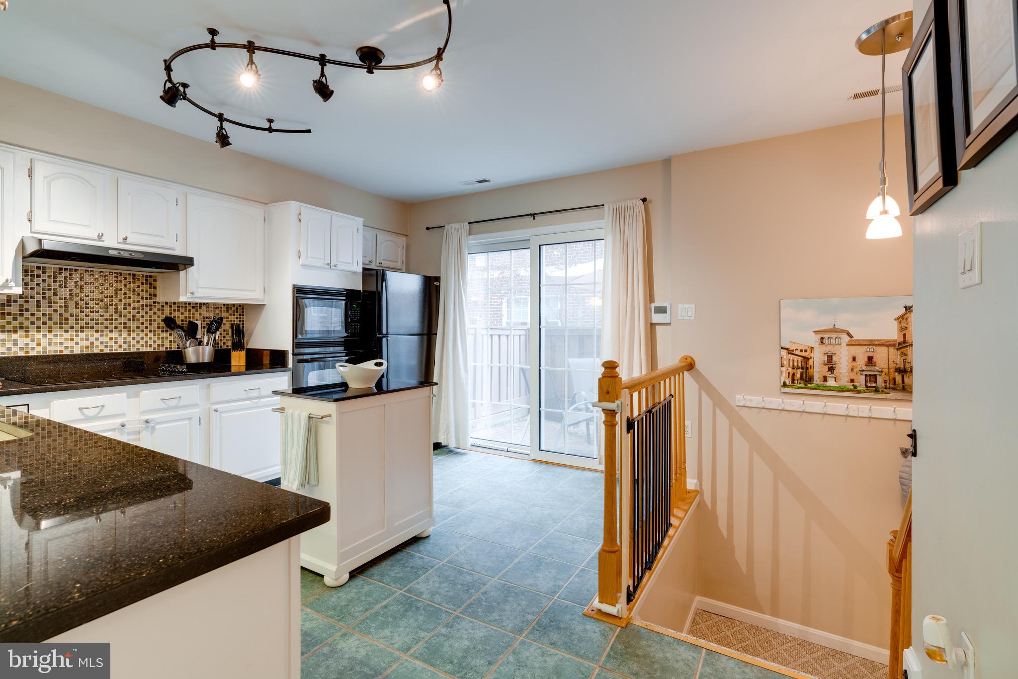 3028 South Glebe Road, Unit 3028 Arlington, VA 22206 - Photo 15 of 43 Kitchen / staircase to garage