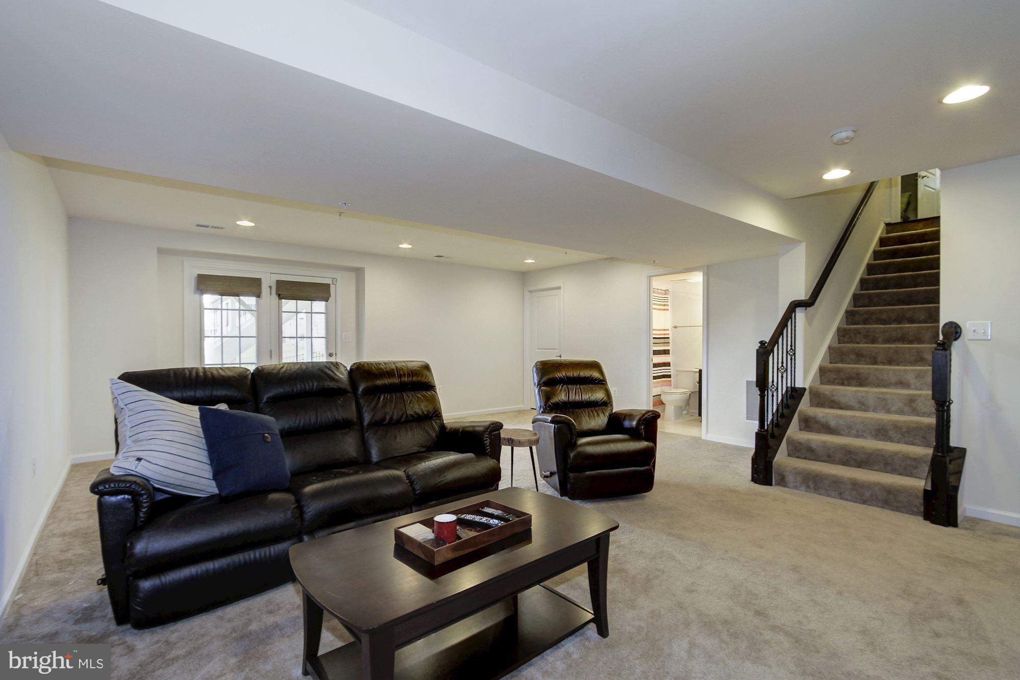 13747 Soaring Wing Lane Silver Spring, MD 20906 - Photo 21 of 27 Finished Lower Level with walkout to fenced yard