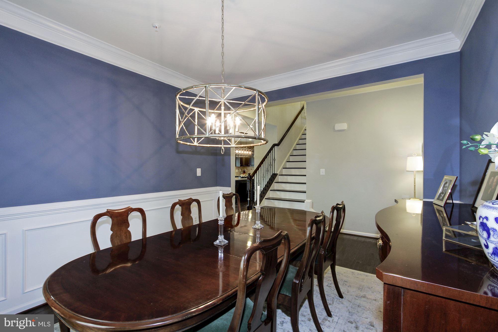 13747 Soaring Wing Lane Silver Spring, MD 20906 - Photo 5 of 27 Nice Dining Room - wainscoting, custom lighting