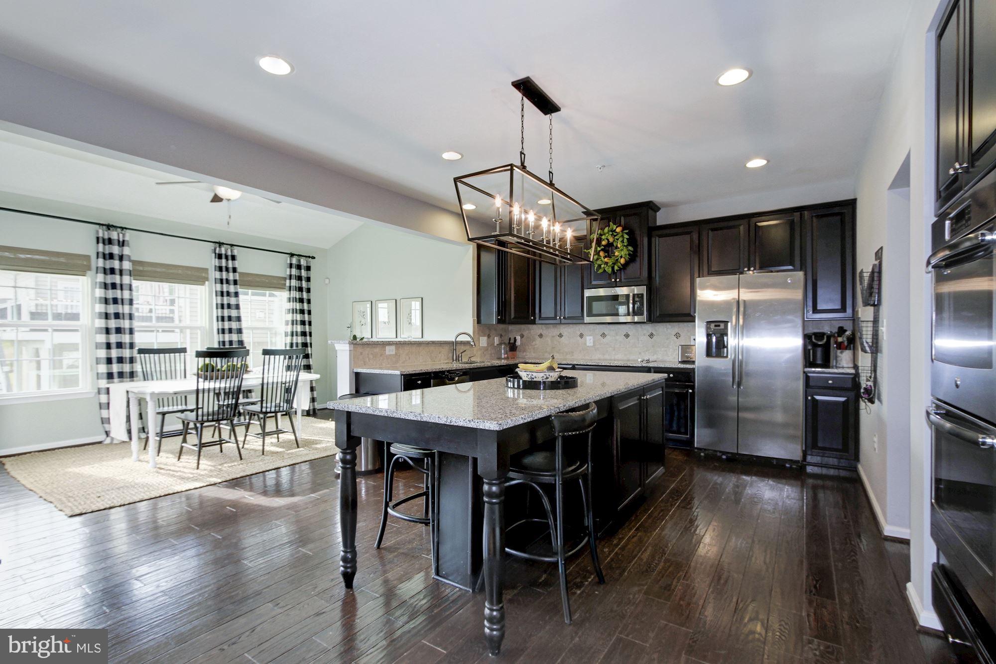13747 Soaring Wing Lane Silver Spring, MD 20906 - Photo 6 of 27 Smashing open chef's kitchen with center isle