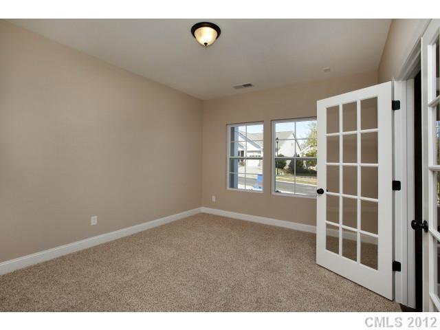 86593 Arrington Road, Unit 102 Lancaster, SC 29720 - Photo 4 of 15 a view of an empty room with a window