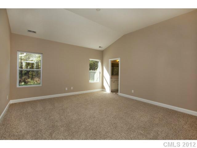 86593 Arrington Road, Unit 102 Lancaster, SC 29720 - Photo 10 of 15 a view of an empty room with a window