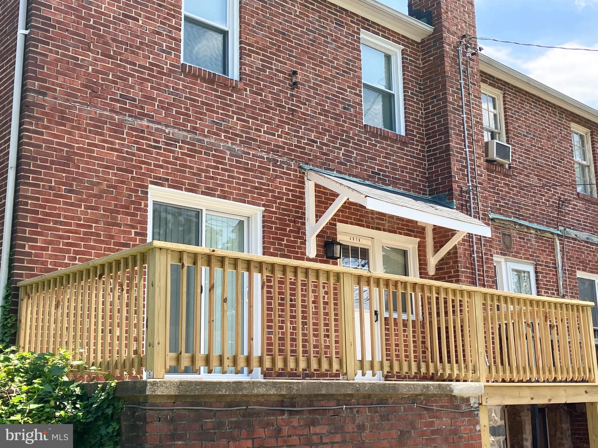 4818 Coleherne Road Baltimore, MD 21229 - Photo 3 of 20 Secure, elevated rear deck for entertaining.