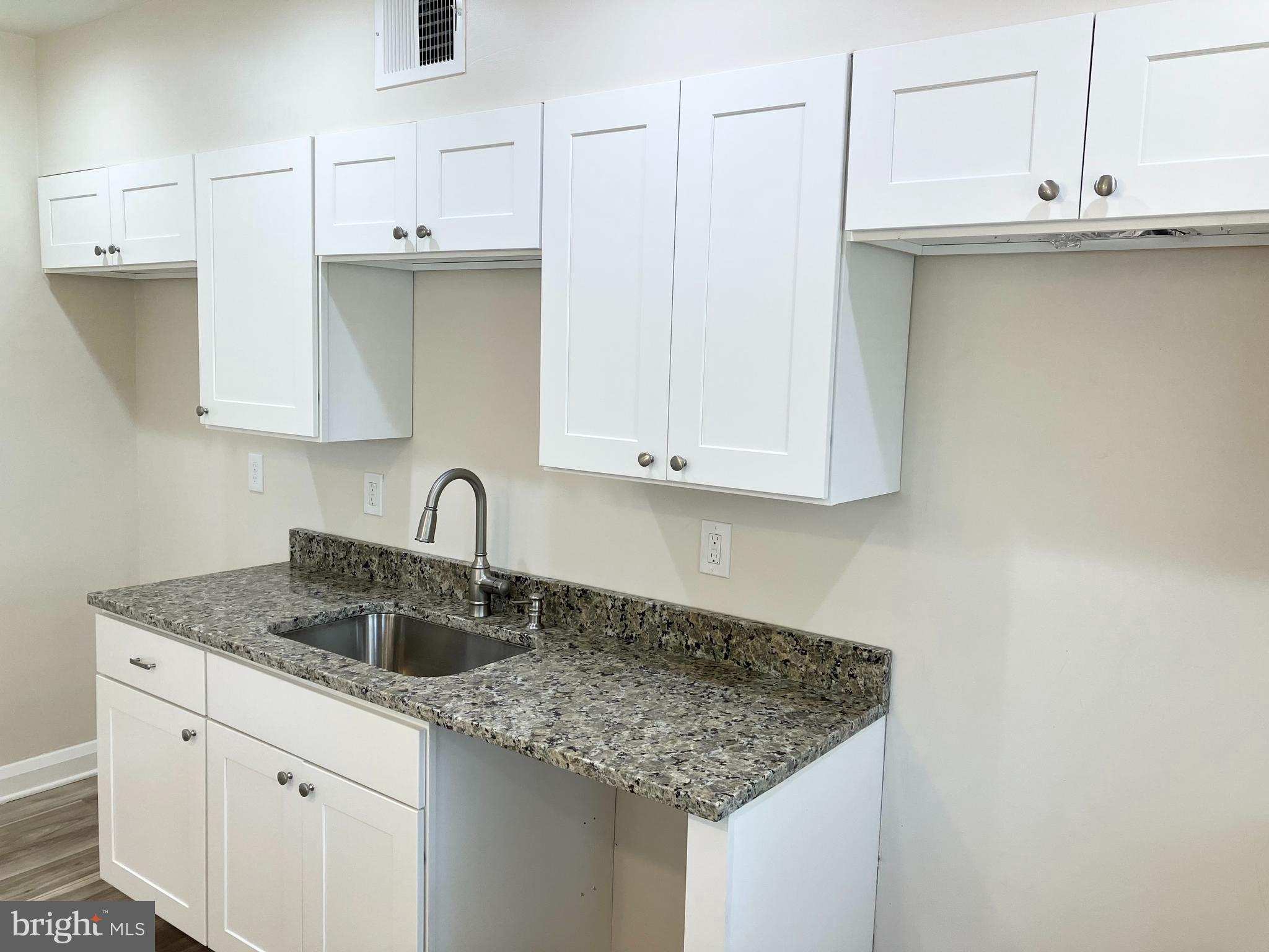4818 Coleherne Road Baltimore, MD 21229 - Photo 8 of 20 New S. Steel appliances will look fabulous here.