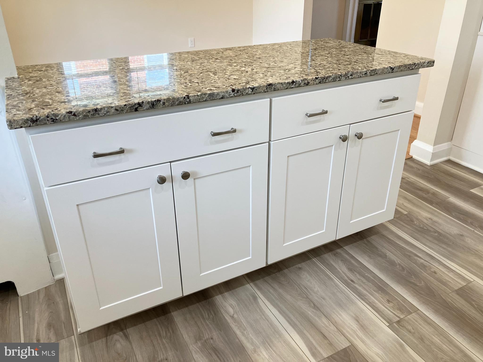 4818 Coleherne Road Baltimore, MD 21229 - Photo 9 of 20 Quality cabinets, hardware, granite and laminate.