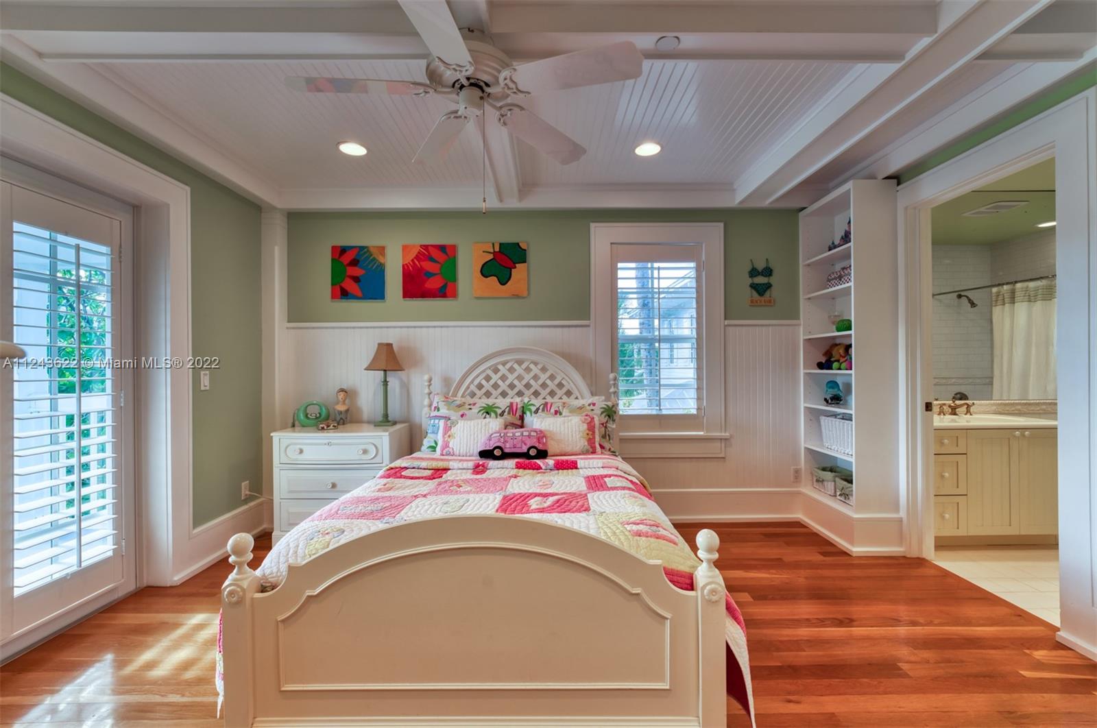 32 Sunset Key Drive Key West, FL 33040 - Photo 14 of 49 a living room with baby crib furniture and a window