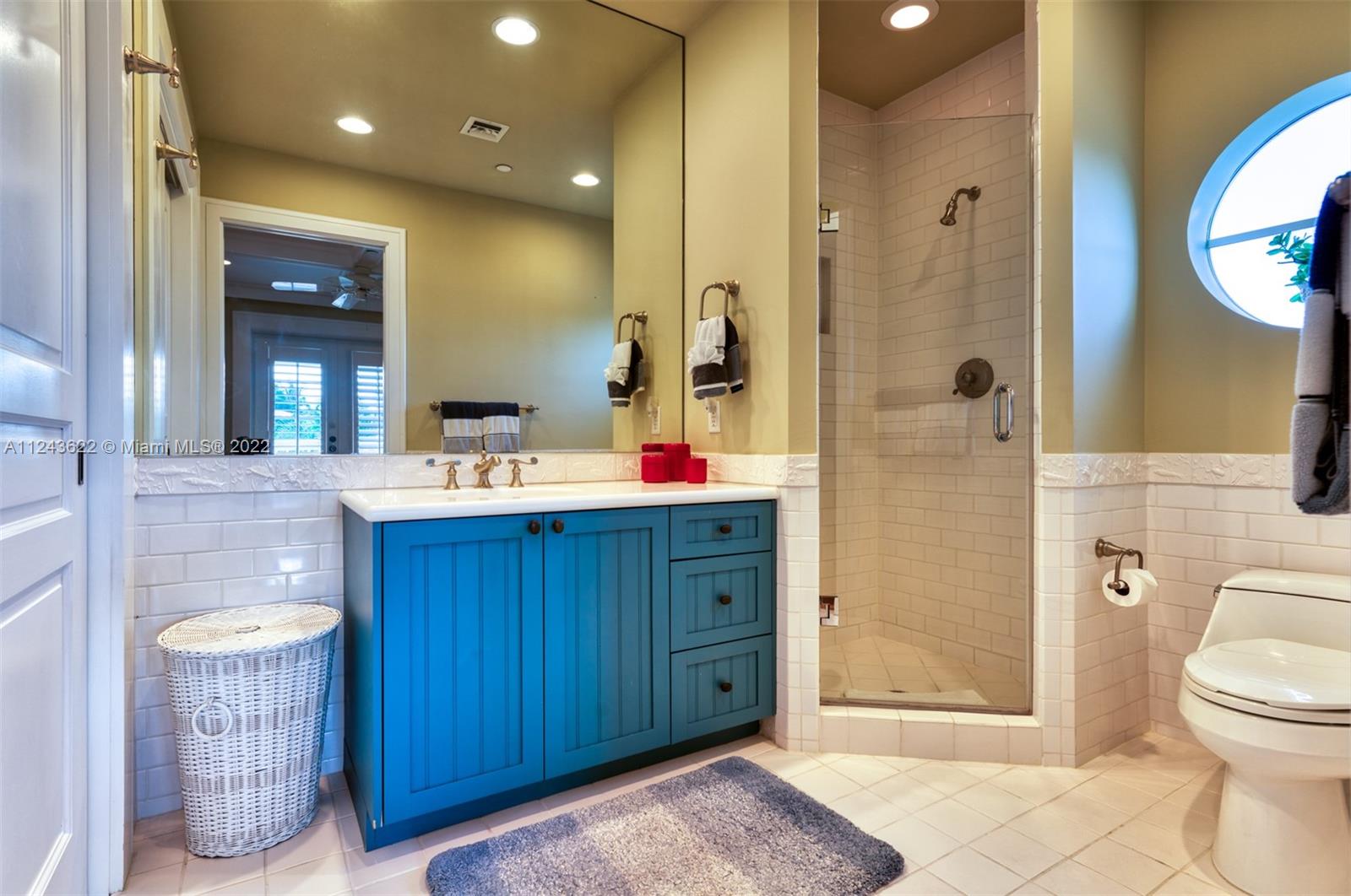 32 Sunset Key Drive Key West, FL 33040 - Photo 17 of 49 a spacious bathroom with a granite countertop sink a toilet and shower
