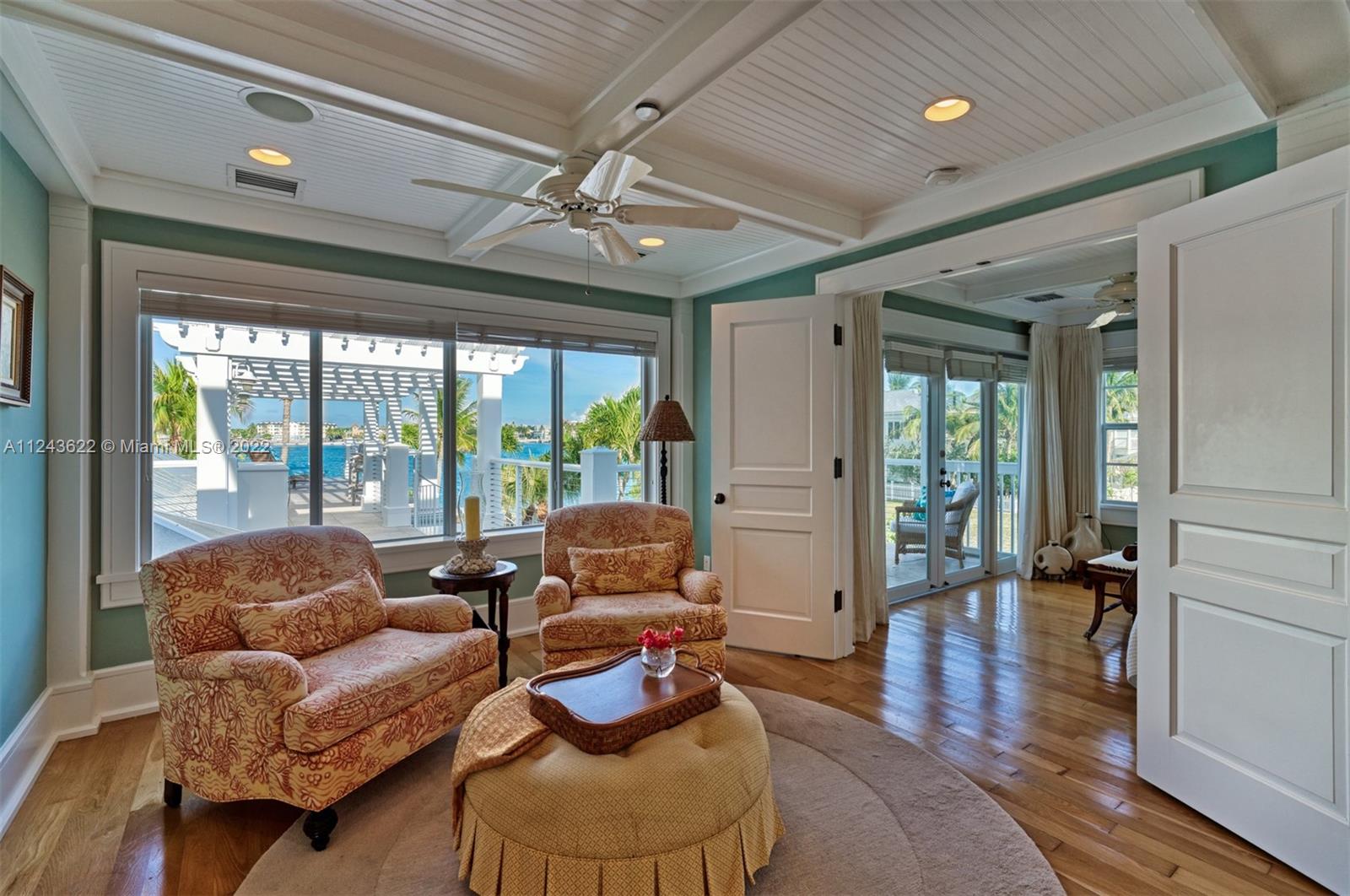 32 Sunset Key Drive Key West, FL 33040 - Photo 18 of 49 a living room with furniture and a large window