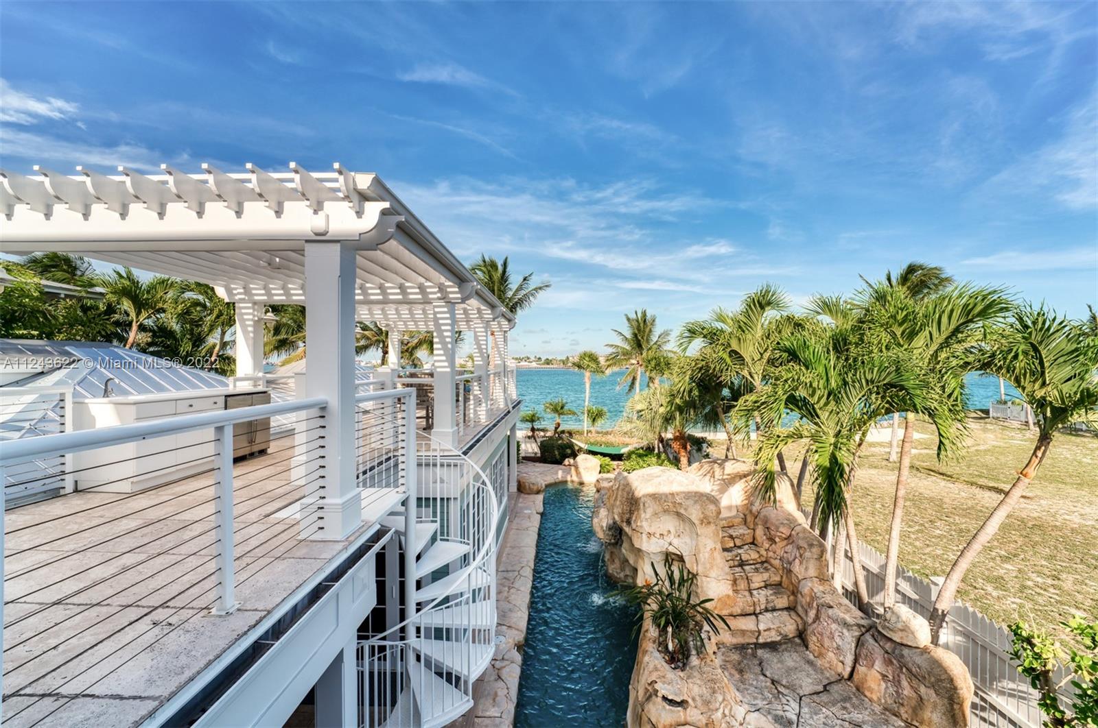 32 Sunset Key Drive Key West, FL 33040 - Photo 28 of 49 a view of a chairs and table in patio