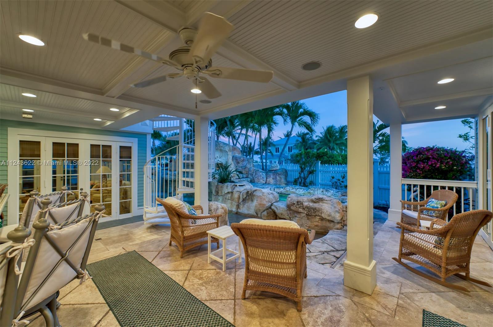 32 Sunset Key Drive Key West, FL 33040 - Photo 34 of 49 a living room with furniture and a floor to ceiling window