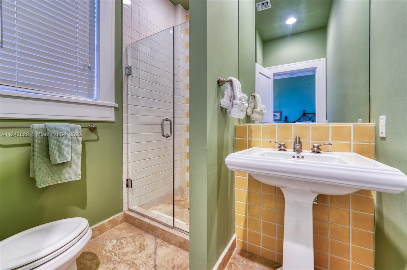 32 Sunset Key Drive Key West, FL 33040 - Photo 37 of 49 a bathroom with a sink and toilet