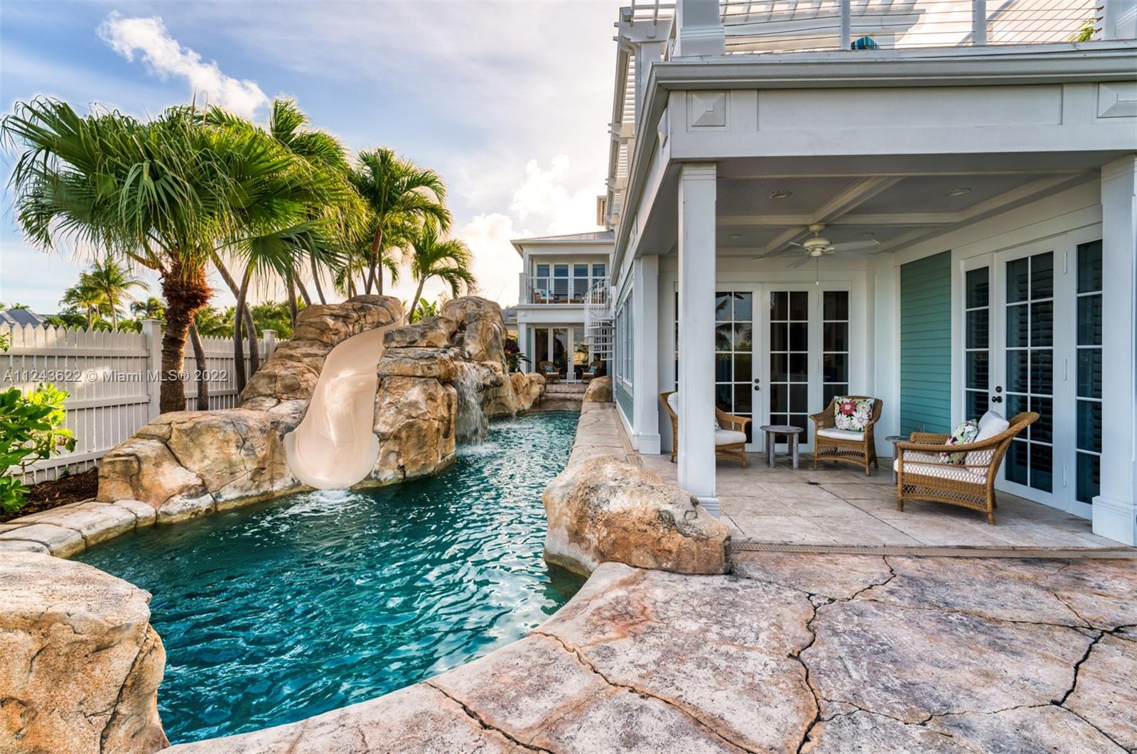 32 Sunset Key Drive Key West, FL 33040 - Photo 41 of 49 a view of a house with backyard sitting area and garden
