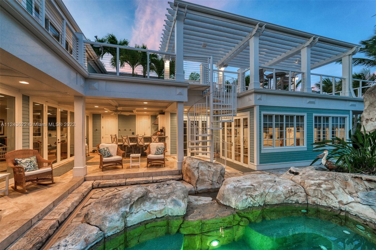 32 Sunset Key Drive Key West, FL 33040 - Photo 46 of 49 a front view of house with yard outdoor seating and barbeque oven