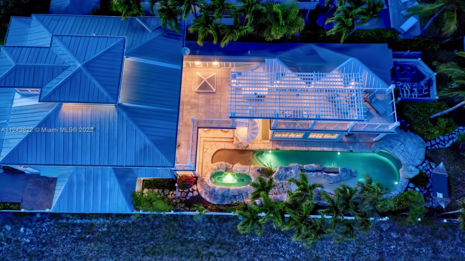 32 Sunset Key Drive Key West, FL 33040 - Photo 48 of 49 a view of a wooden door with an outdoor seating