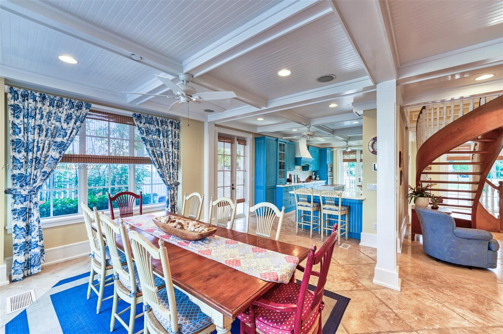 32 Sunset Key Drive Key West, FL 33040 - Photo 8 of 49 a dining room with furniture a chandelier and wooden floor