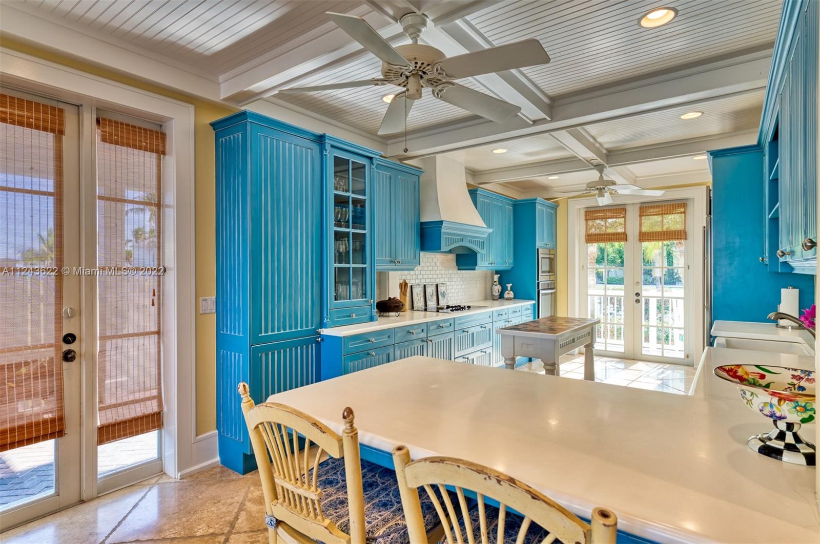 32 Sunset Key Drive Key West, FL 33040 - Photo 9 of 49 a room with a bed and a table