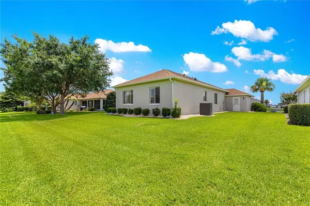 a view of a golf course with a lake