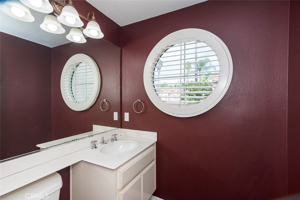 27726 Rubidoux Mission Viejo, CA 92692 - Photo 17 of 31 an old bathroom with a sink and a mirror