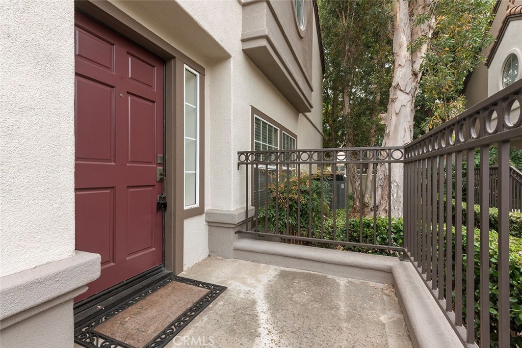 27726 Rubidoux Mission Viejo, CA 92692 - Photo 2 of 31 a view of a house with a small yard and wooden floor and fence