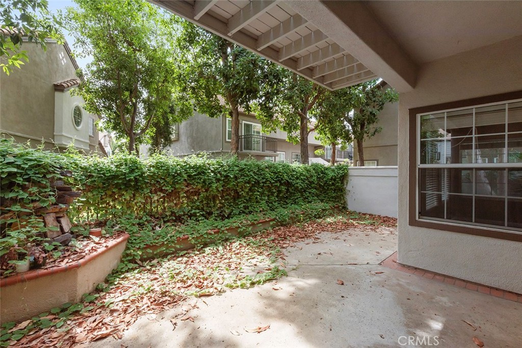 27726 Rubidoux Mission Viejo, CA 92692 - Photo 22 of 31 a view of a backyard with potted plants