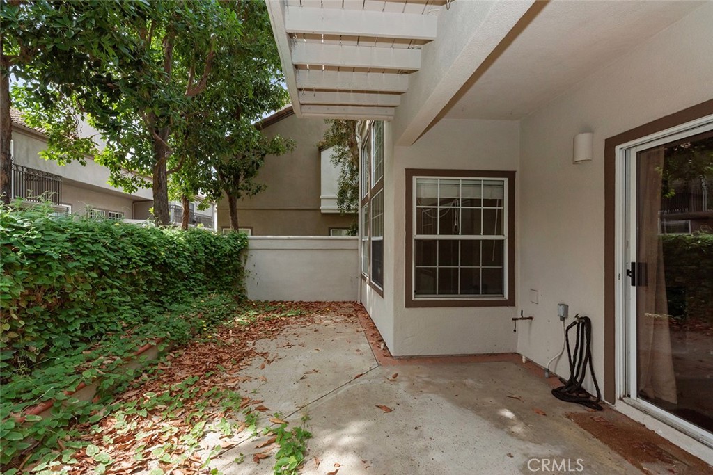 27726 Rubidoux Mission Viejo, CA 92692 - Photo 23 of 31 a front view of a house with a yard