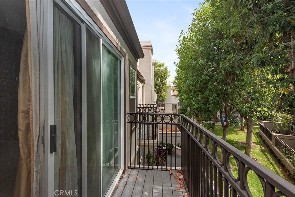 27726 Rubidoux Mission Viejo, CA 92692 - Photo 26 of 31 a view of balcony with wooden floor and fence