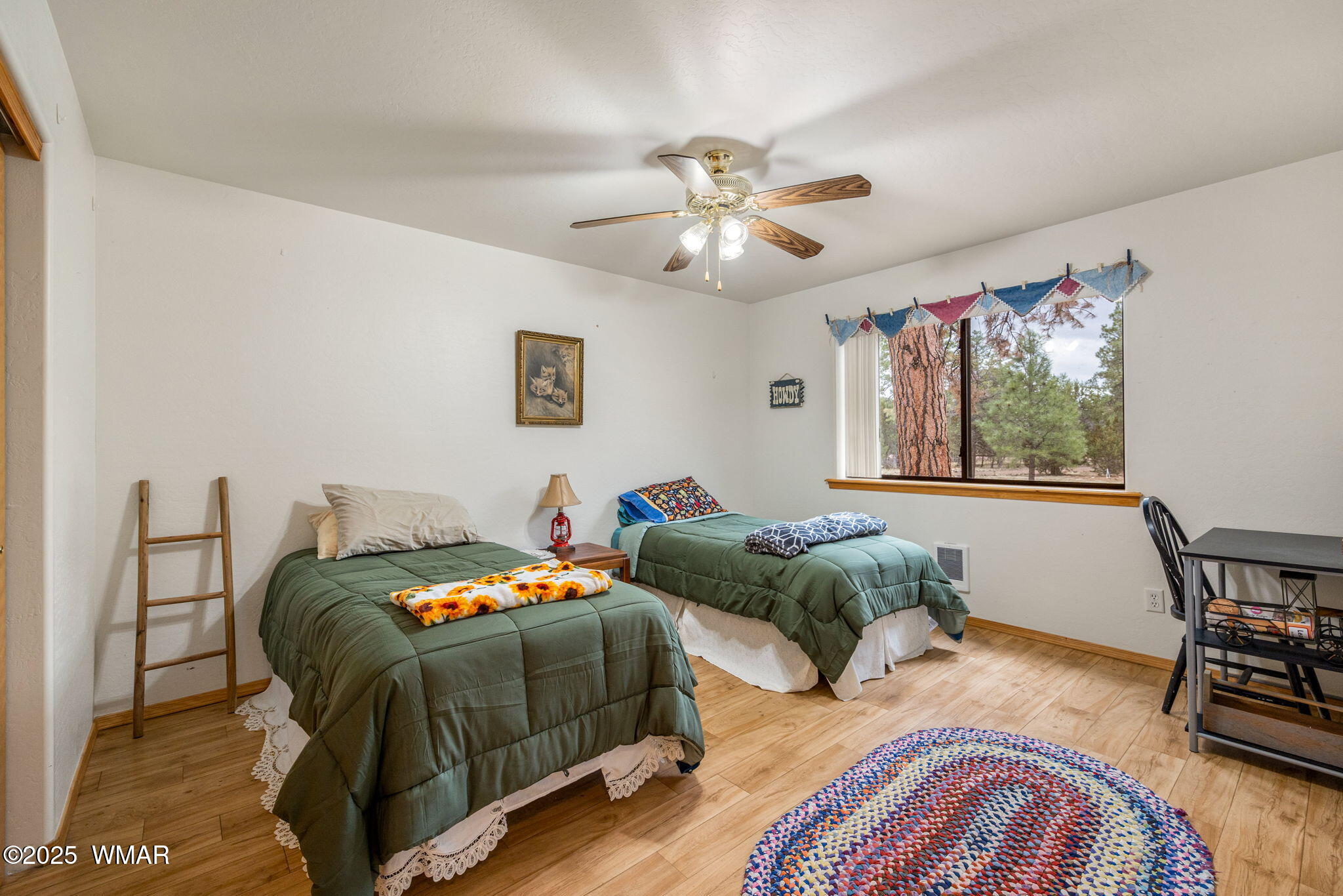 2088 Round-Up Road Overgaard, AZ 85933 - Photo 12 of 35 a bedroom with two beds and a desk