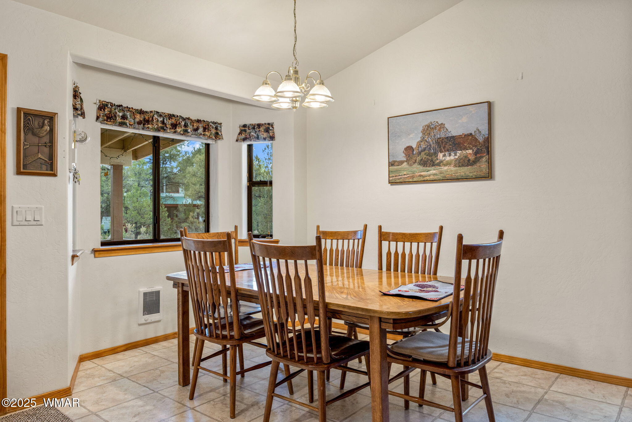 2088 Round-Up Road Overgaard, AZ 85933 - Photo 2 of 35 a view of a dining room with furniture window and outside view